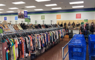 Women’s clothing – Racks and purses Women's clothing racks and handbags at Goodwill
